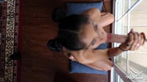 Horny asian teen ass fucks suction cup dildo on glass door