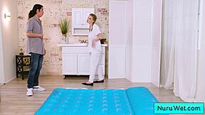 sexy pigtailed blonde masseuse octavia red gives david lee a wet nuru massage with her big natural tits.