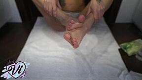 Look at this brunette showing her oiled feet in close-up foot fetish!