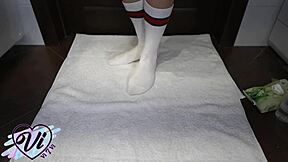 Look at this brunette showing her oiled feet in close-up foot fetish!