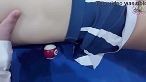 thai girl in uniform climbs pool table for fun game in dorm