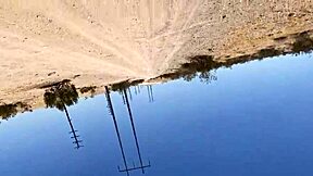 A petite ebony woman decides to cheat on her white boyfriend during an outdoor encounter with a tattooed black man.