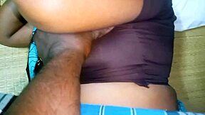 desi aunty enjoys intimate moments with young 18+ boy in bedroom.