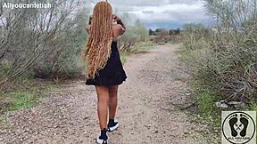 Ebony with big ass walks upskirt in sneakers.