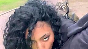 A person drinks milk in a public park in Buenos Aires during the day