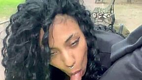 A person drinks milk in a public park in Buenos Aires during the day