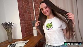 petite teen feels awkward on camera.