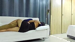 Pretty big ass in black dress gets fucked on couch
