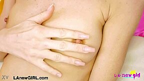 Petite Blonde Model Reveals Stunning Figure On Sofa.