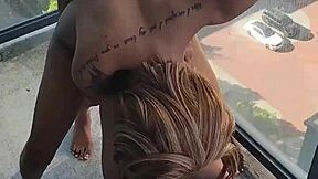 Kashofficials bent over on the balcony, getting her tight pussy strapped hard by renity love