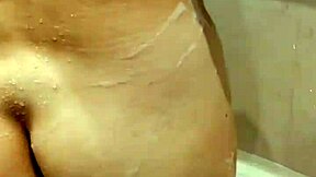 My step sister allows me to watch her shower, enjoying the voyeur attention.