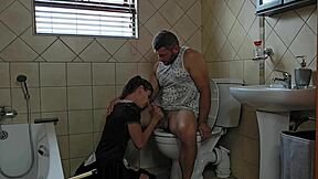 Petite Slut Sucks Cock On Toilet