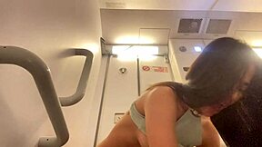 Amateur teen passenger masturbates with creamy orgasm in airplane bathroom, focusing on public fetish and squirting panties play outdoors.