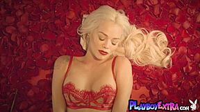 Petite blonde teen muse elsa jean strips lingerie among red petals revealing skinny pussy and tits naked.