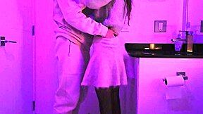 Teen feels intense pleasure in club toilet.