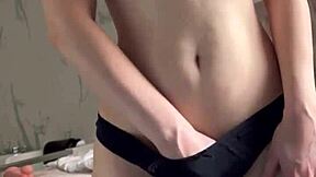 Cute girl masturbates with dildo