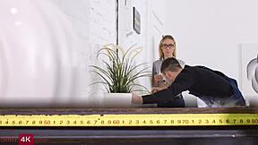 engaging in detailed analysis alongside a messy creative designer during the project session.