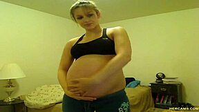 What happens when horny teen slut Tori Taylor teases with big tits and masturbates in blue shorts on webcam?