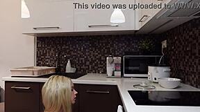 Hot blonde petite 18+ girlfriend flashes tight shaved pussy and bare naked ass under short miniskirt in kitchen