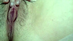 Busty brunette teen fingers hairy pussy outdoors to deep squirting climax.