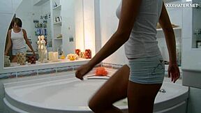 Russian horny slut Sima Zasadilo masturbates wildly in the bathtub