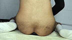 shoving my full tentie and 8 cm diameter cock toy deep in my ass for intense pleasure.