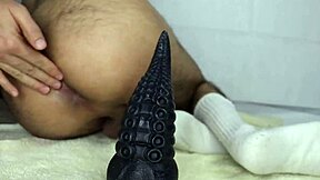 shoving my full tentie and 8 cm diameter cock toy deep in my ass for intense pleasure.