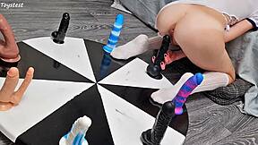 i love how my petite stepsister earns her orgasm with that wheel of dildos game