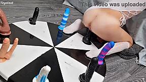 i love how my petite stepsister earns her orgasm with that wheel of dildos game