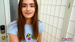 Petite brunette Reese Robbins fingers her tight pussy deep while sucking hard cock for cum swallow