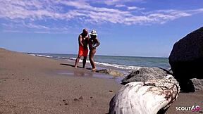 Hey, check out this real mature couple going wild with risky outdoor blowjob and rough doggystyle sex on a public beach in Mexico