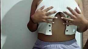 This milf indulges in massaging her big natural tits with real homemade pleasure, focusing on every sensual touch.