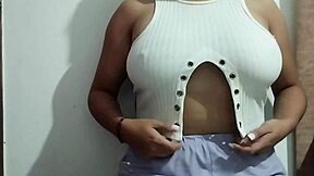 This milf indulges in massaging her big natural tits with real homemade pleasure, focusing on every sensual touch.