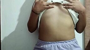 This milf indulges in massaging her big natural tits with real homemade pleasure, focusing on every sensual touch.