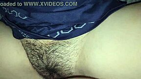 Playing with my stepsister's big juicy hairy pussy while she watches porn. Look at how wet and tight it gets in this homemade amateur video.