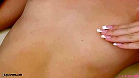 Blonde beauty with teen 18+ spirit poses on sofa for casting interview showing petite body in solo photoshoot moment.