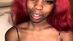 Hey, that red hair ebony slim girl is handling a big black cock in the dorm