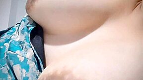 horny latina babe plays with her big natural tits and puffy nipples after party!