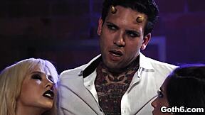 Crazy goth teen sluts shared a giant dick in a hardcore foursome.