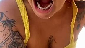 Hey, check out this young exhibitionist flashing her puffy pussy lips in bikini at the beach