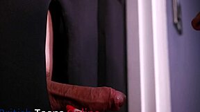 redhead nurse steps into the gloryhole booth and eagerly sucks on that throbbing cock for a messy facial finish