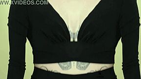 I love how Kit Summers rocks that two-piece black outfit with deep plunging neck in her photoshoot