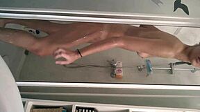 Isn't this sexy teen girl in the shower just irresistible with her brunette hair and shaved body?