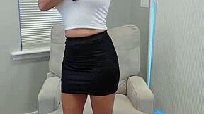 In this video, a petite wife with big tits and small waist tries on various heels, socks, and miniskirts.