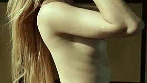 This tiny Russian teen blonde does a hot striptease in clothes that get ripped while posing with her shaved pussy