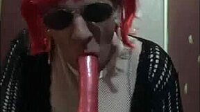 Amateur bisexual crossdresser fucks dildo on stick in stockings then sucks it clean ass to mouth