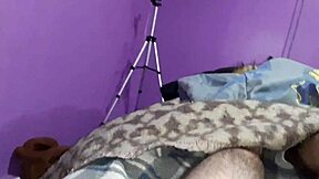 I love sneaking under the sheets to suck my boyfriend's hard penis eagerly.