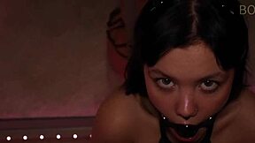Thrusting monster cock deep into her throat after removing the gag for intense insertion