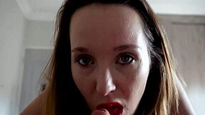Brunette with red lipstick gives pov blowjob before tight pussy creampie ride.