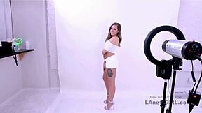 Elegant brunette stunner auditions for modeling role. She gets intimate on the sofa.